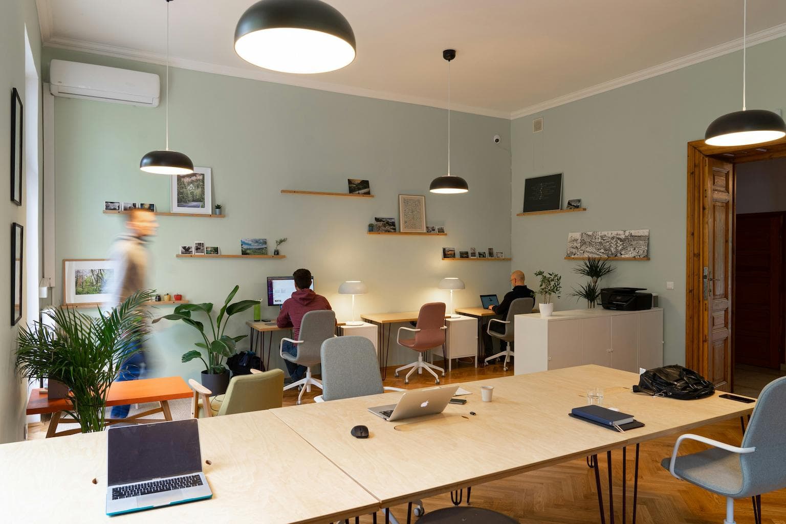 Software developers working at desks in an office