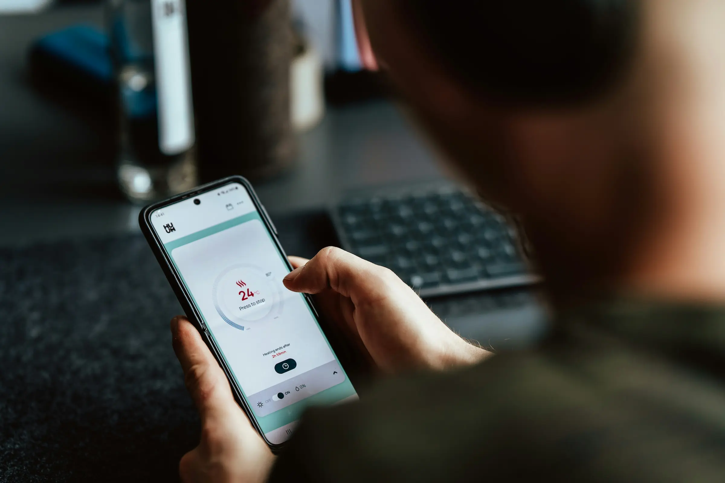 Mobile developer browsing a mobile app on a smartphone